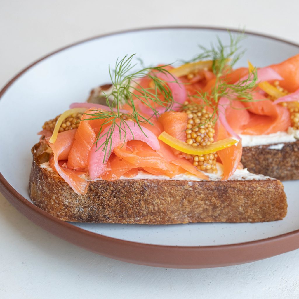 A plate of smoked salmon on toast